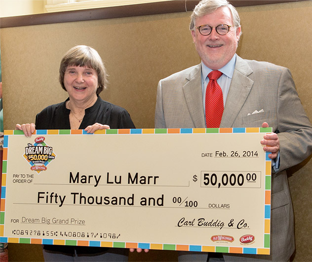 Mary Lu holding check